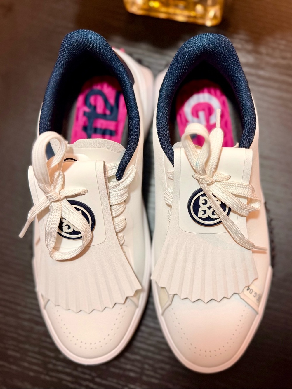 G/FORE Women’s G.112 Kiltie spikeless golf shoes in white with navy 8.5